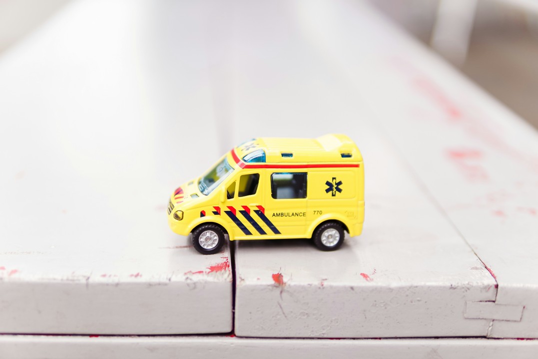 A tiny toy ambulance.